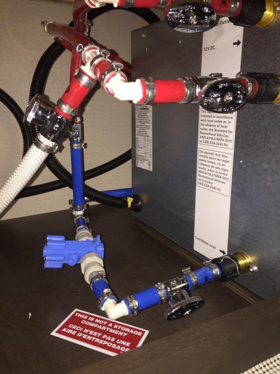 Truma under sink plumbing.jpg