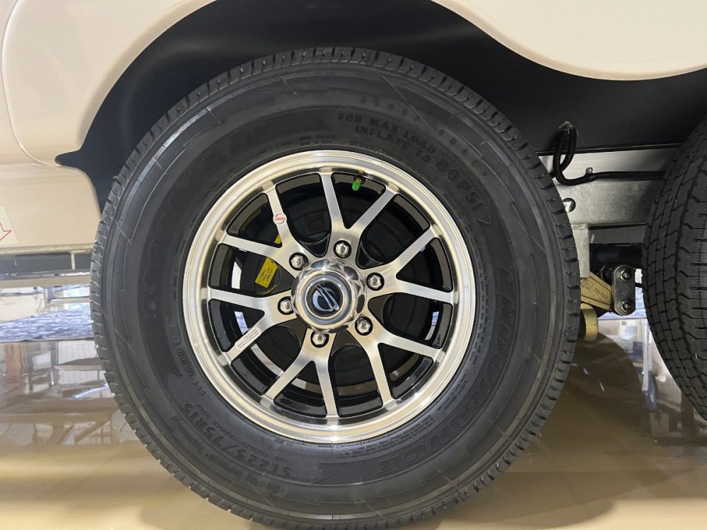 15” Goodyears on new style wheels.