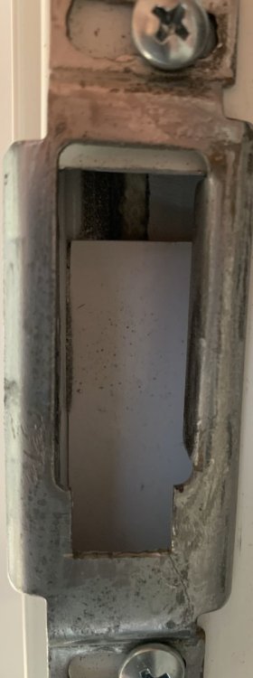 square opening I cut to allow deadbolt to engage strike plate.jpeg