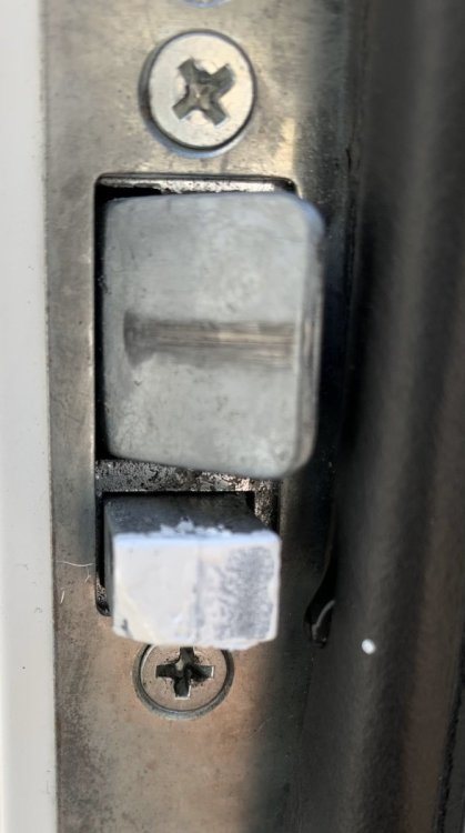 marker on deadbolt latch.jpeg