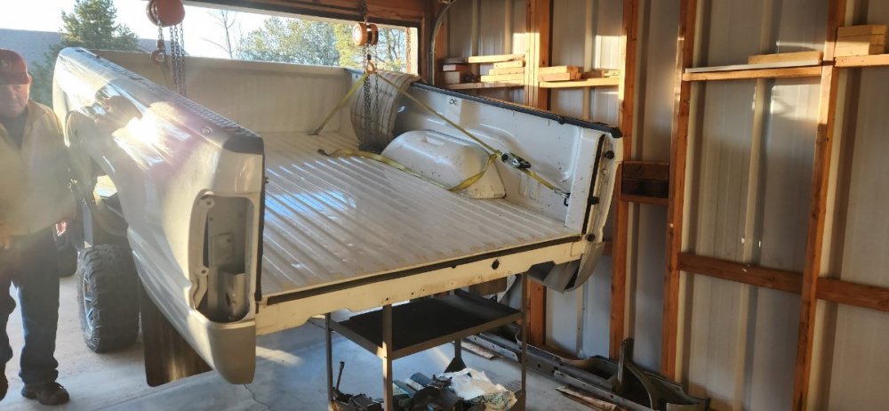 Bed hoisted Ram out ready to mount.jpg