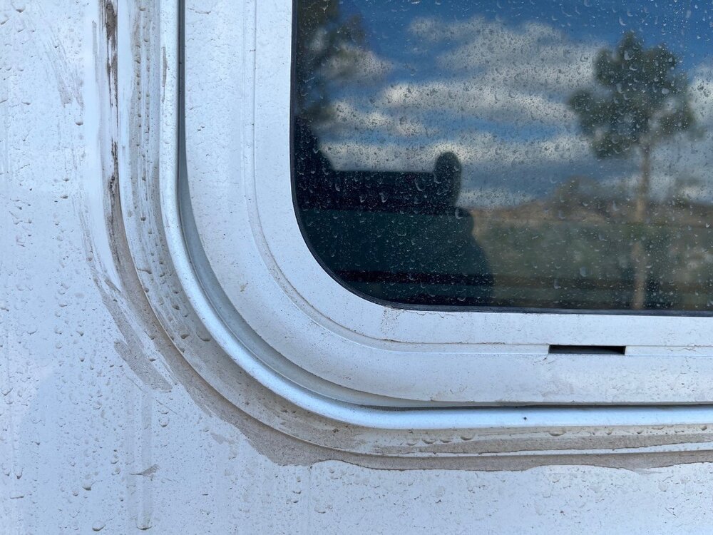 Window Caulk Mess.jpg