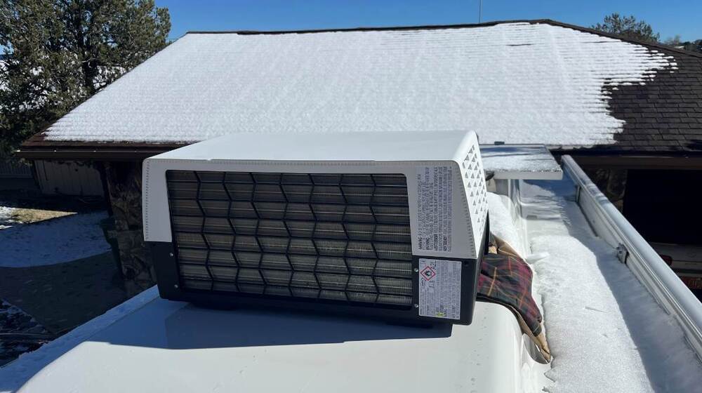 Oliver Chill Cube Install on Jacket in Snow.jpg